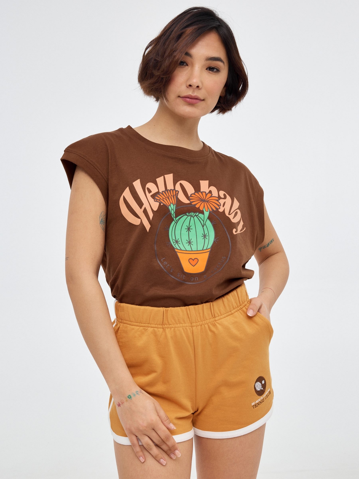Embroidered knitted shorts ochre middle front view