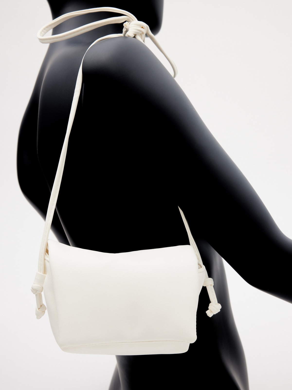 Leather effect crossbody bag white with a model