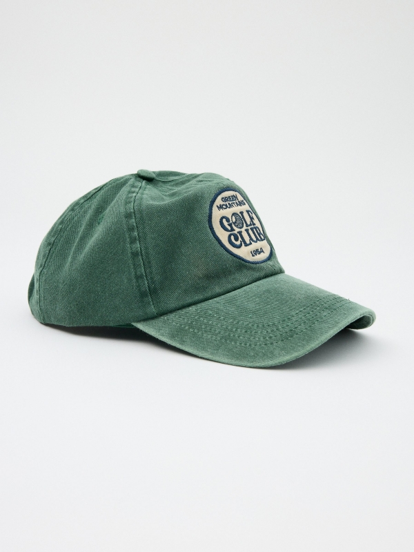 Baseball cap logo green detail view