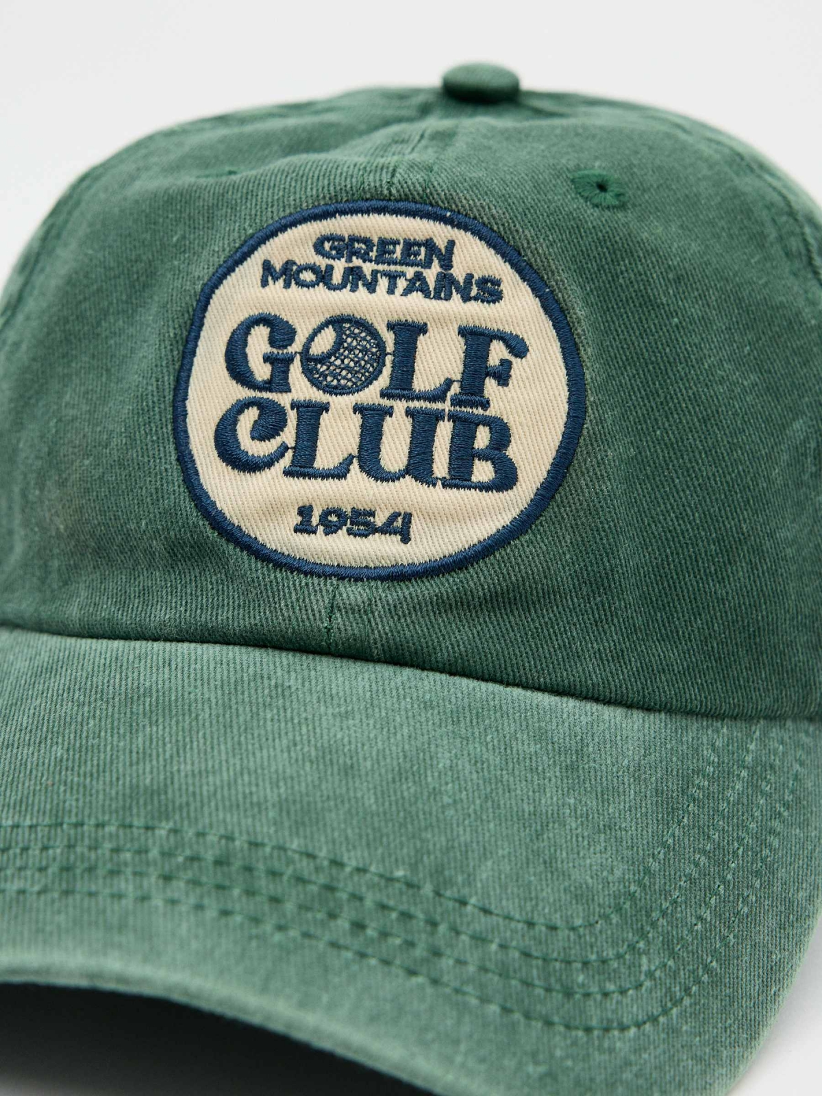 Gorra baseball logo verde vista detalle
