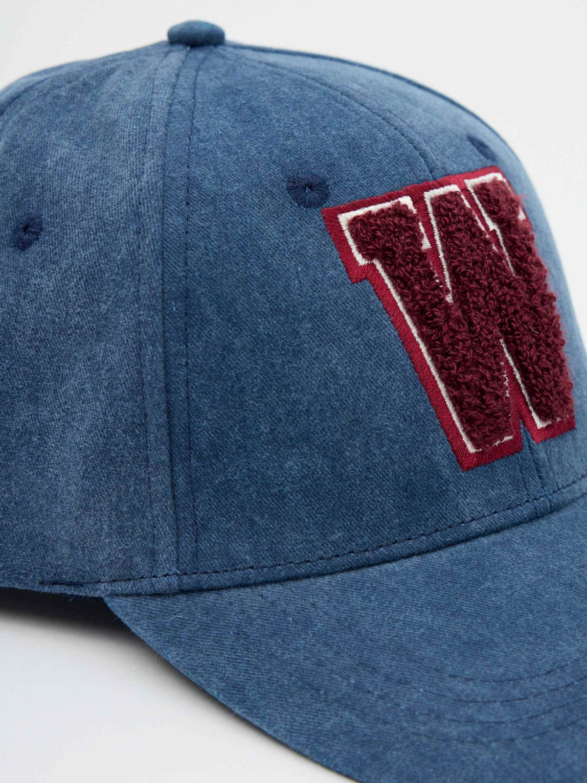 Baseball cap logo blue 45º middle back view
