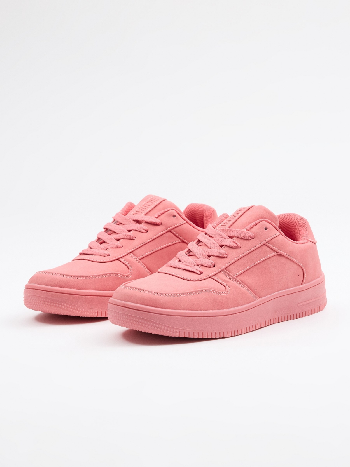 Pink casual sneaker coral 45º front view