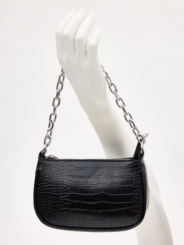 Black leather effect bag black with a model