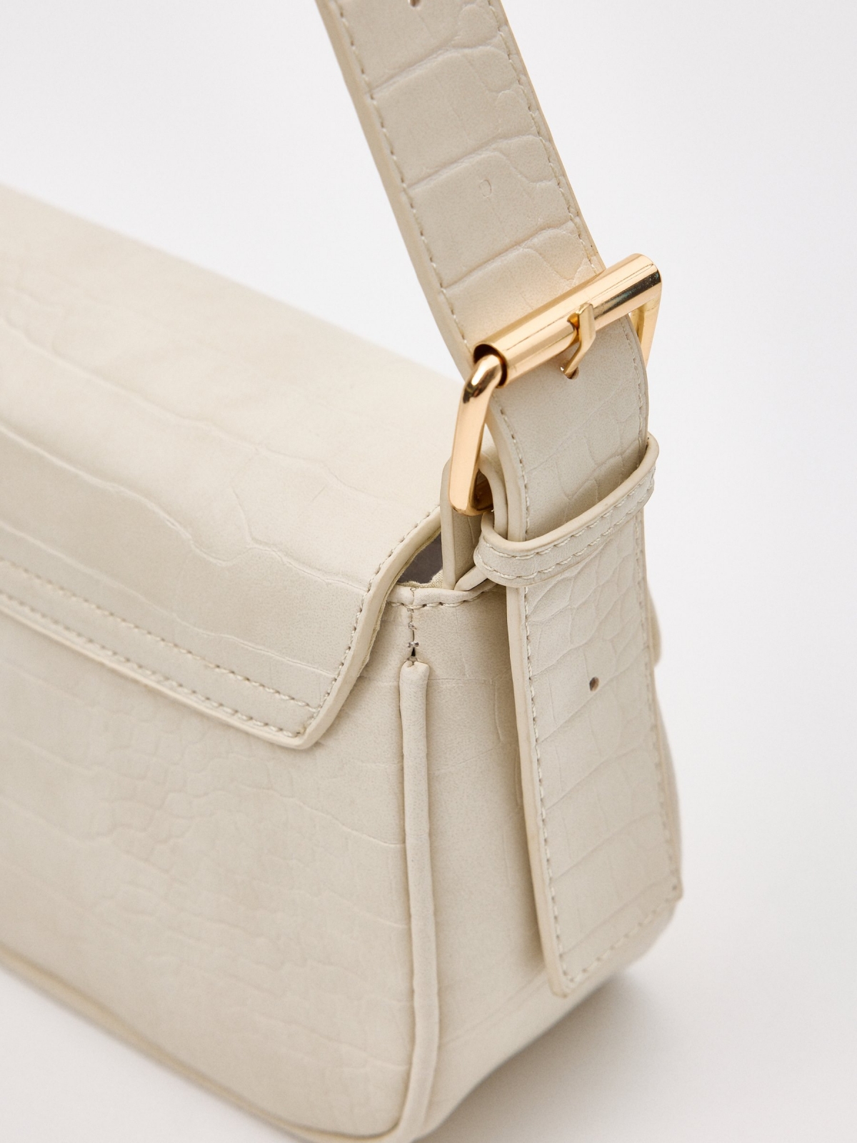 White leather effect bag off white detail view