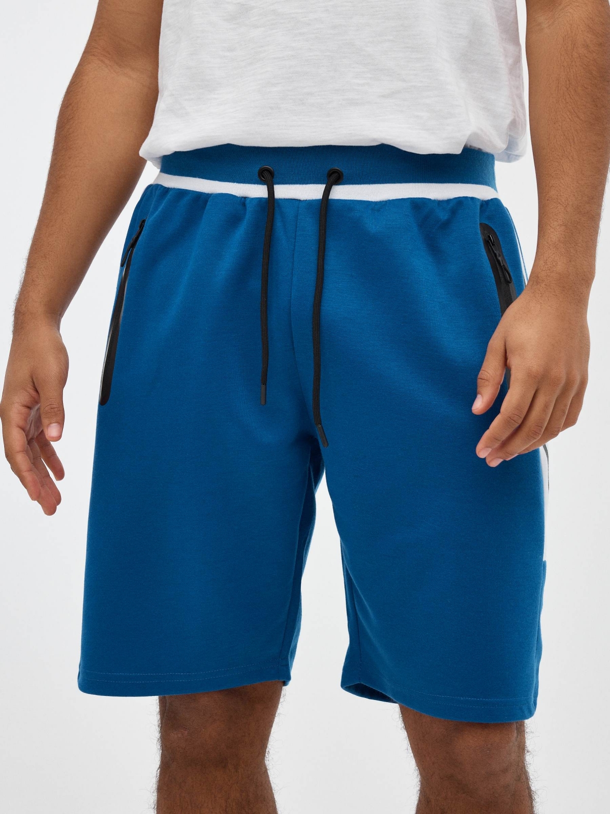 Blue Bermuda jogger shorts electric blue detail view