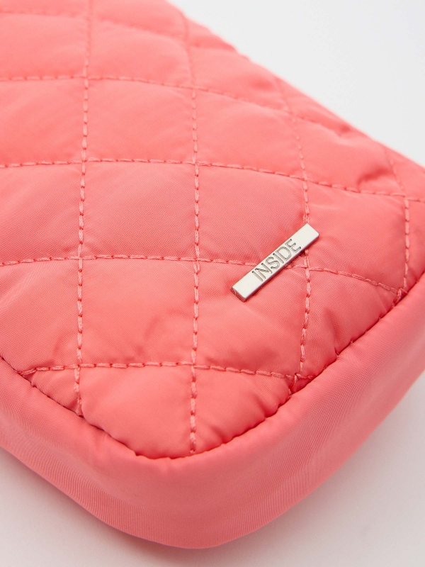 Mini-saqueta de couro rosa coral vista lateral 45º