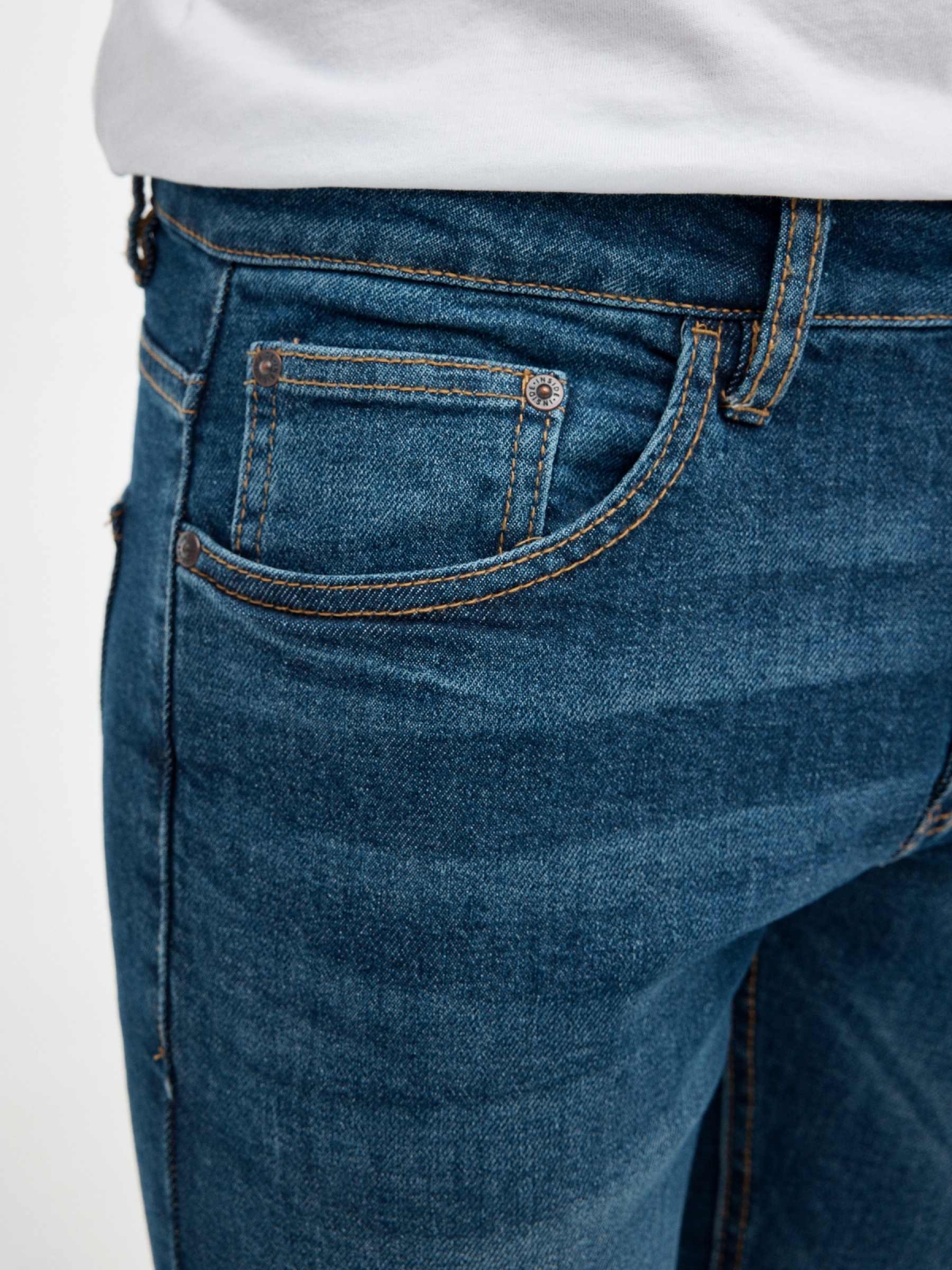Regular denim jeans blue foreground
