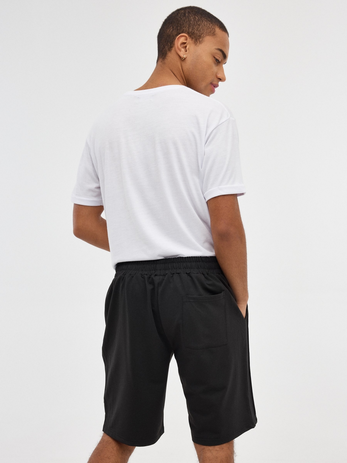 Black Bermuda jogger shorts black middle back view