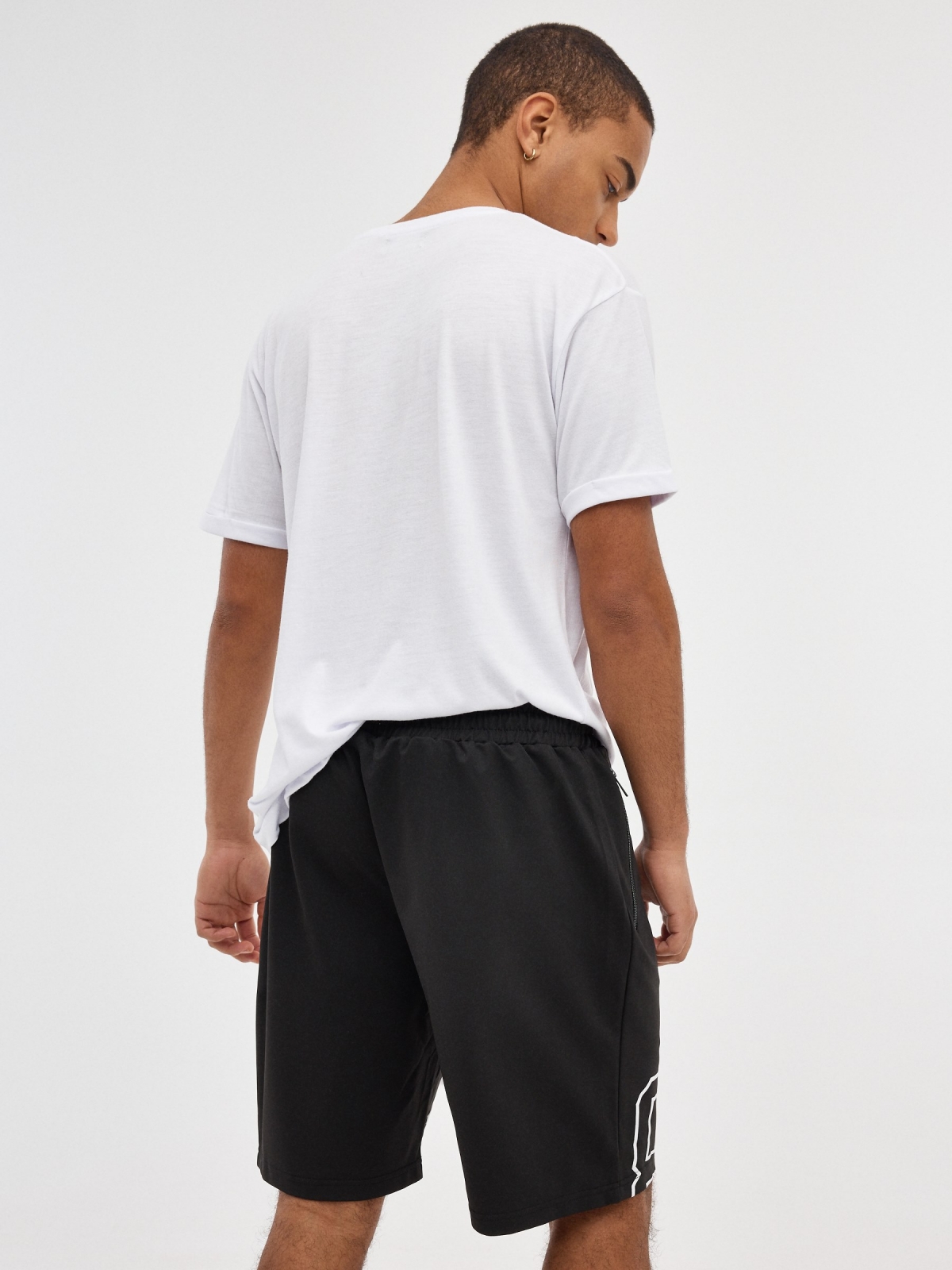 Printed Bermuda jogger shorts black middle back view