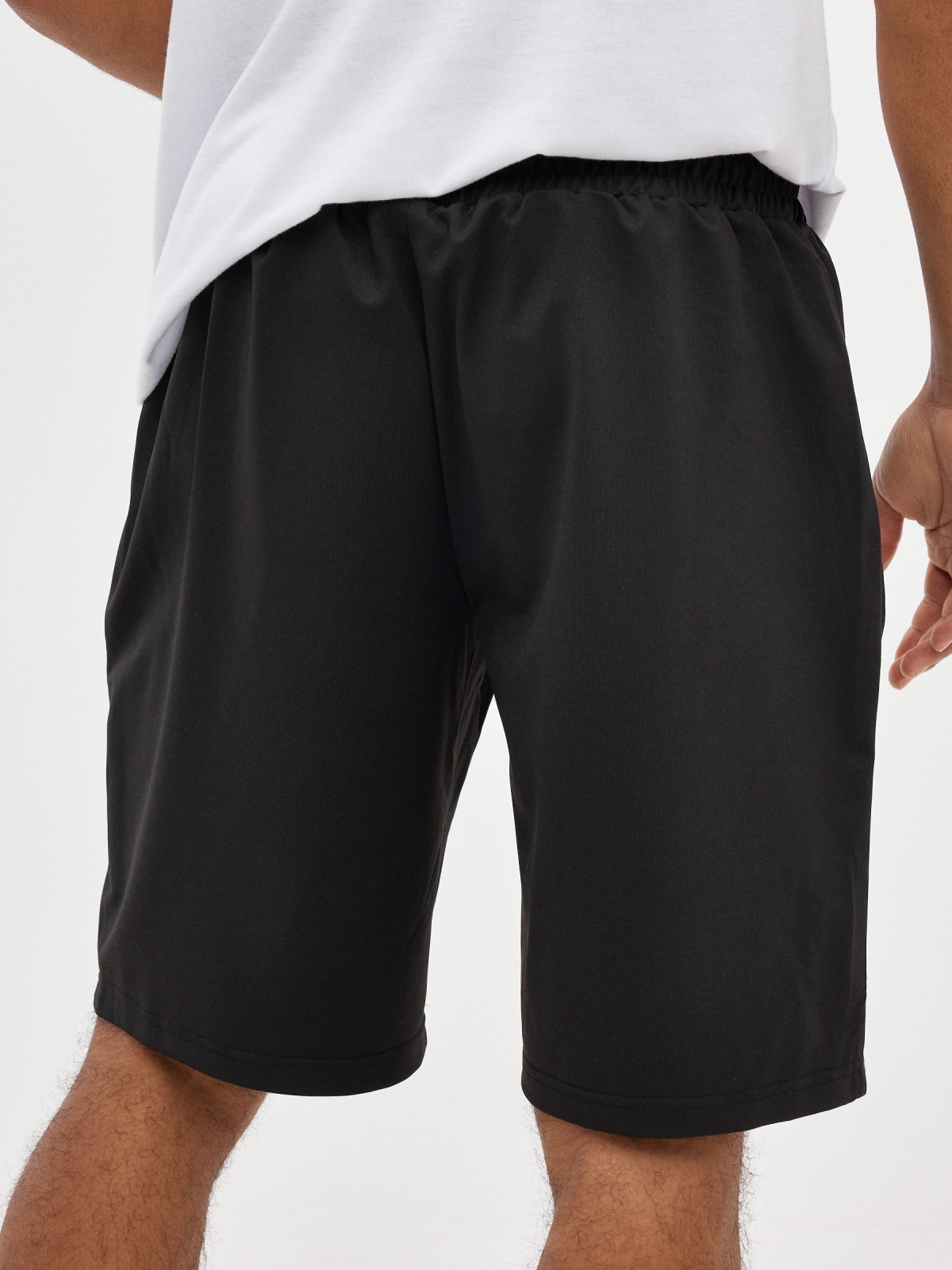 Printed Bermuda jogger shorts black detail view