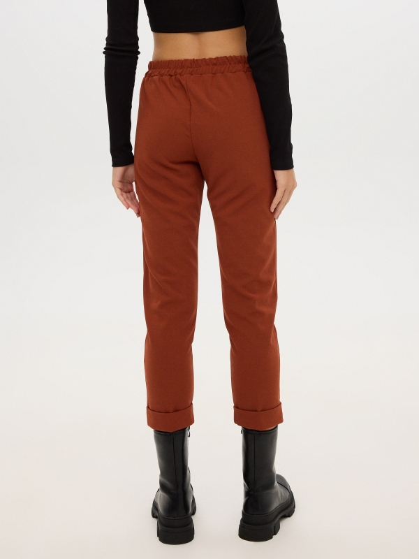 Jogger pants brown middle back view