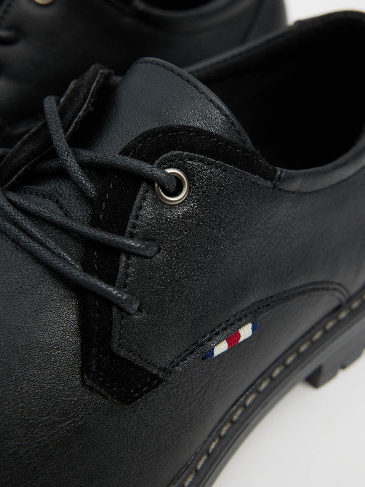 Black leather effect shoe black detail view