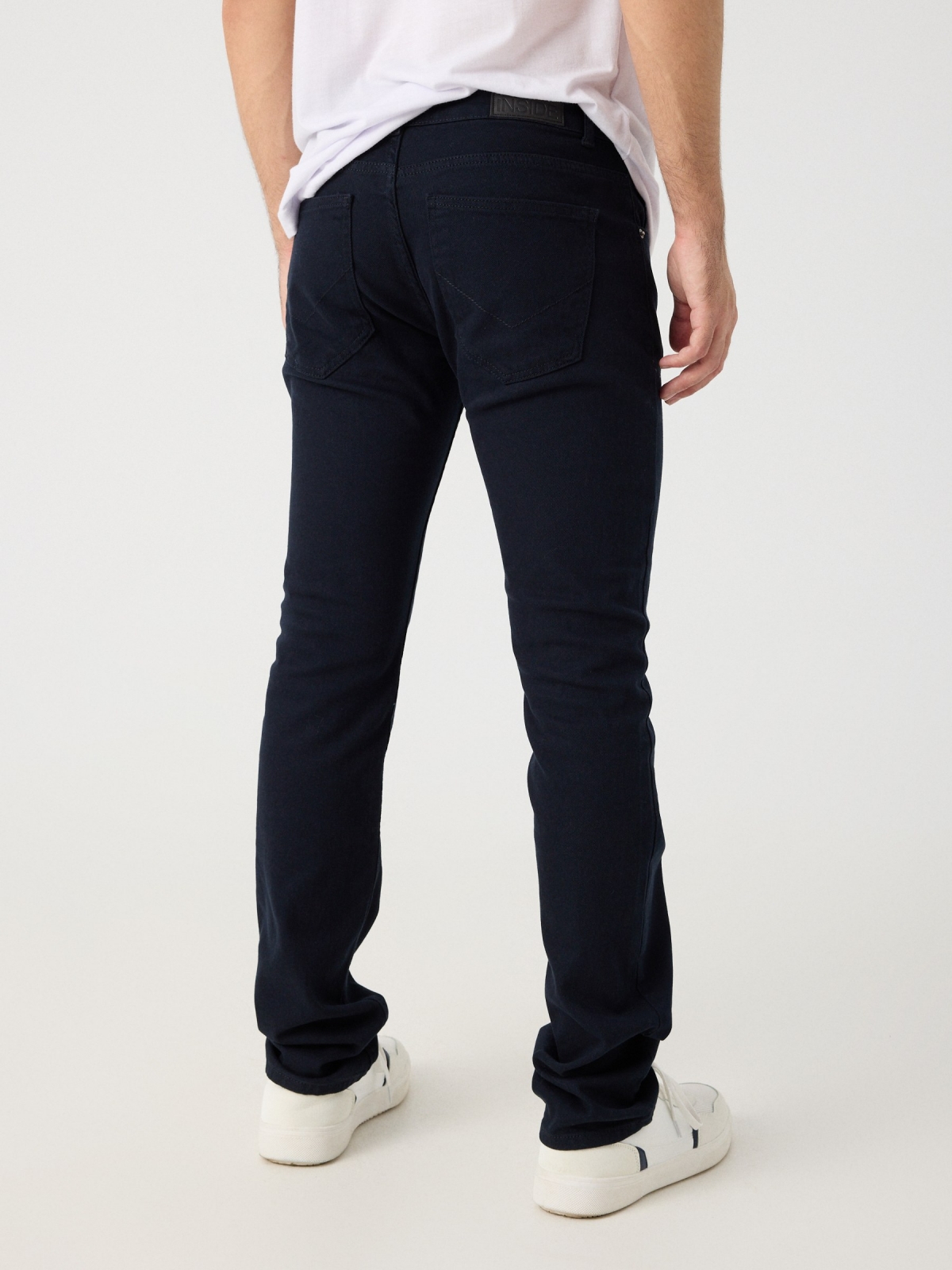 Regular five-pocket trousers navy middle back view