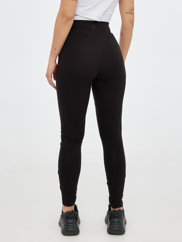 Legging with mesh details black middle back view