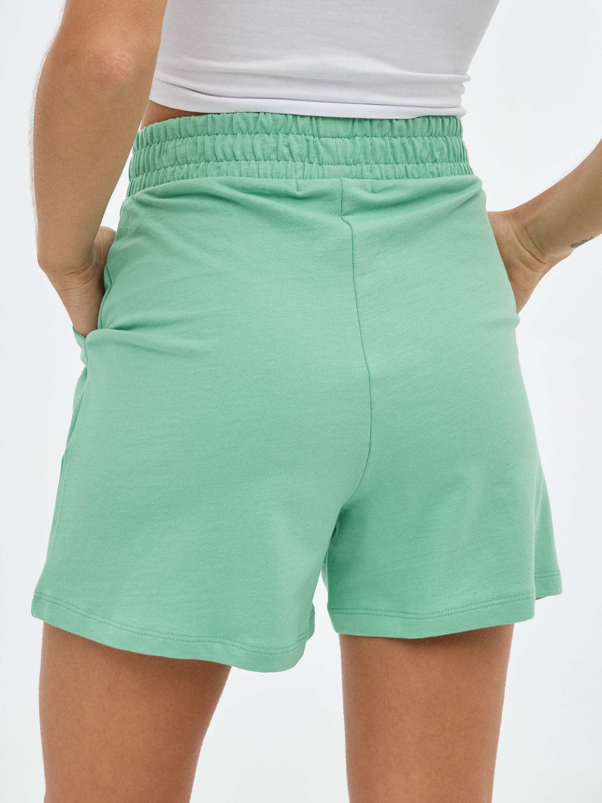 Plush green shorts mint detail view