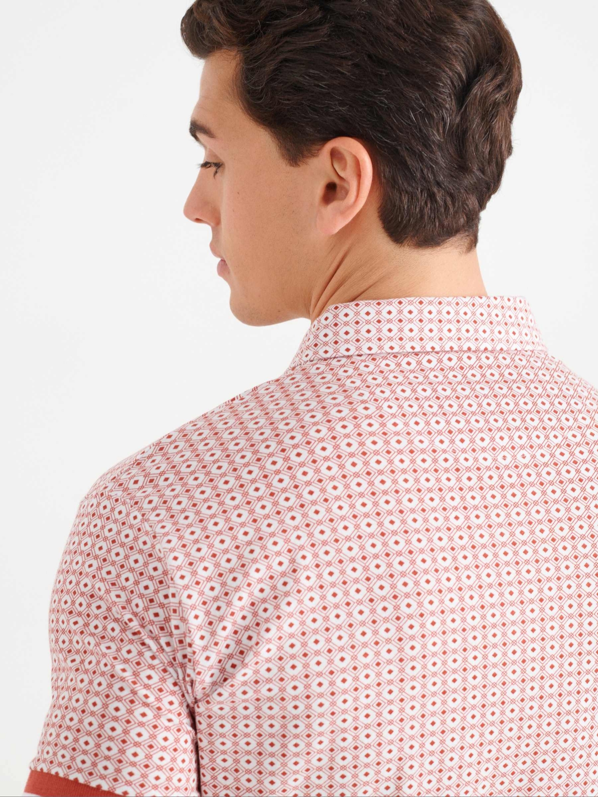 Jacquard polo shirt with pocket orangish red detail view
