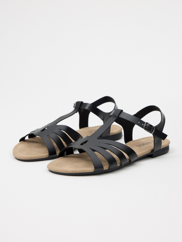 Sandals with crossed straps black/beige 45º front view