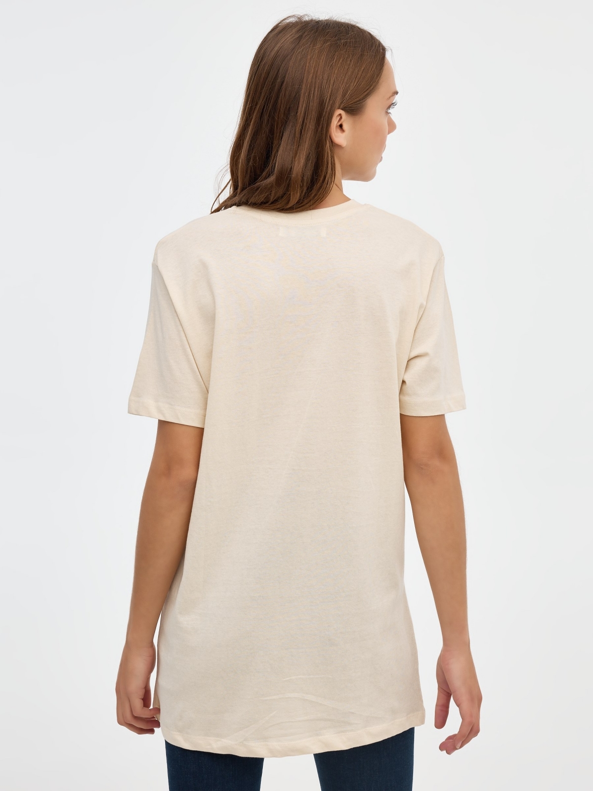 Balancing T-shirt sand middle back view