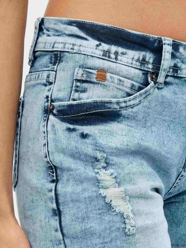 Distressed blue denim shorts blue detail view