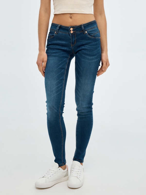 Low-rise distressed skinny jeans blue middle front view