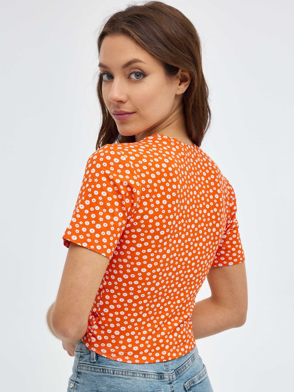 Polka-dot T-shirt with knot orange middle back view
