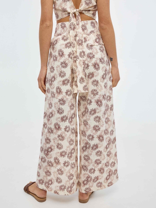 Wide leg print trousers sand middle back view