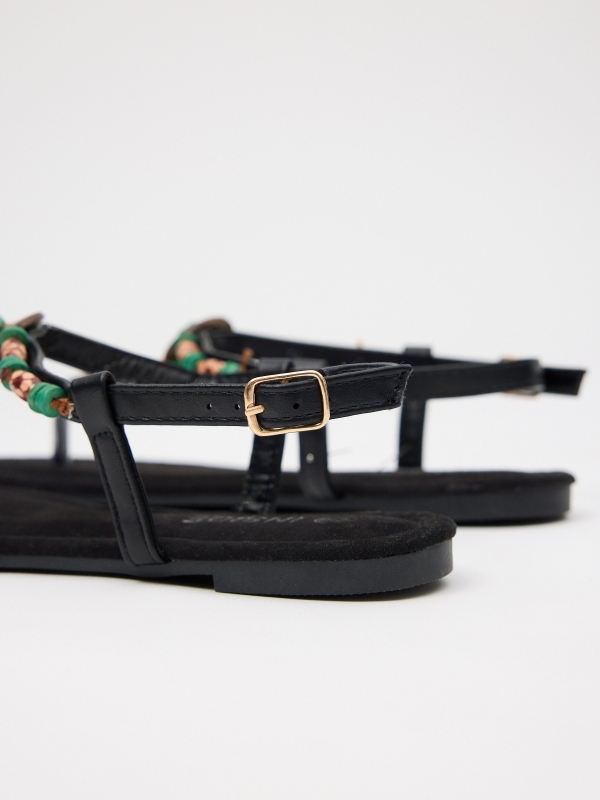 Sandal toe strap with avalorius multicolor detail view