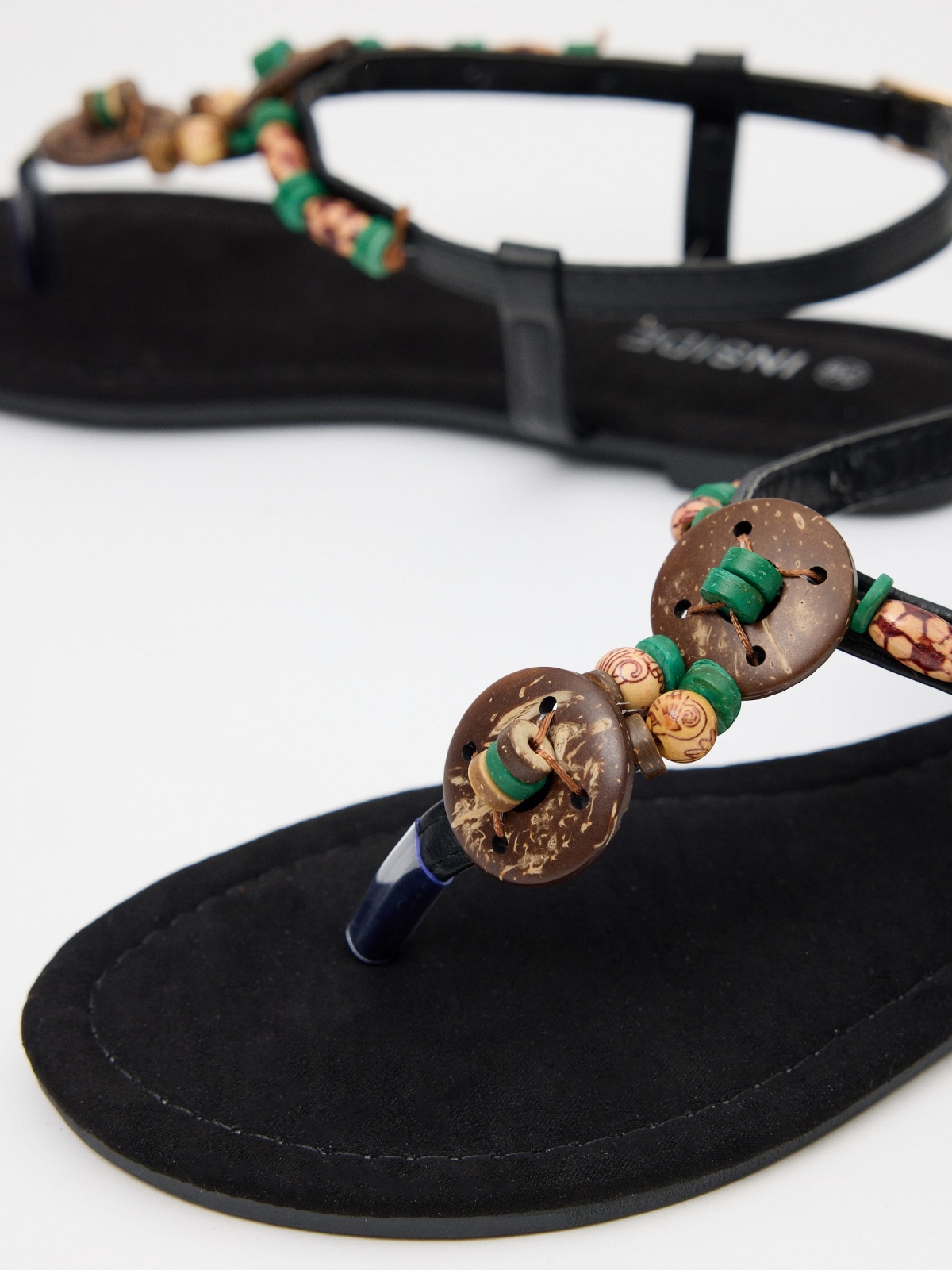 Sandal toe strap with avalorius multicolor detail view