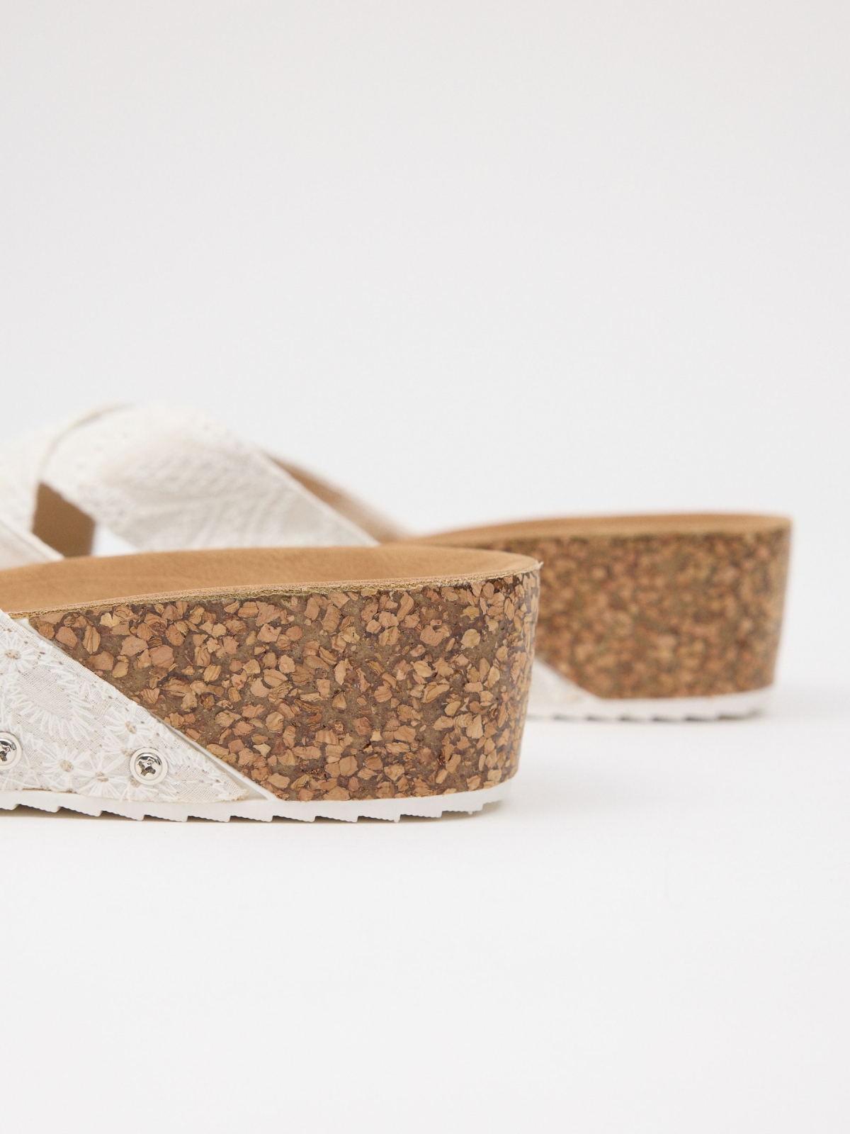 Wedge with embroidered cross straps off white detail view