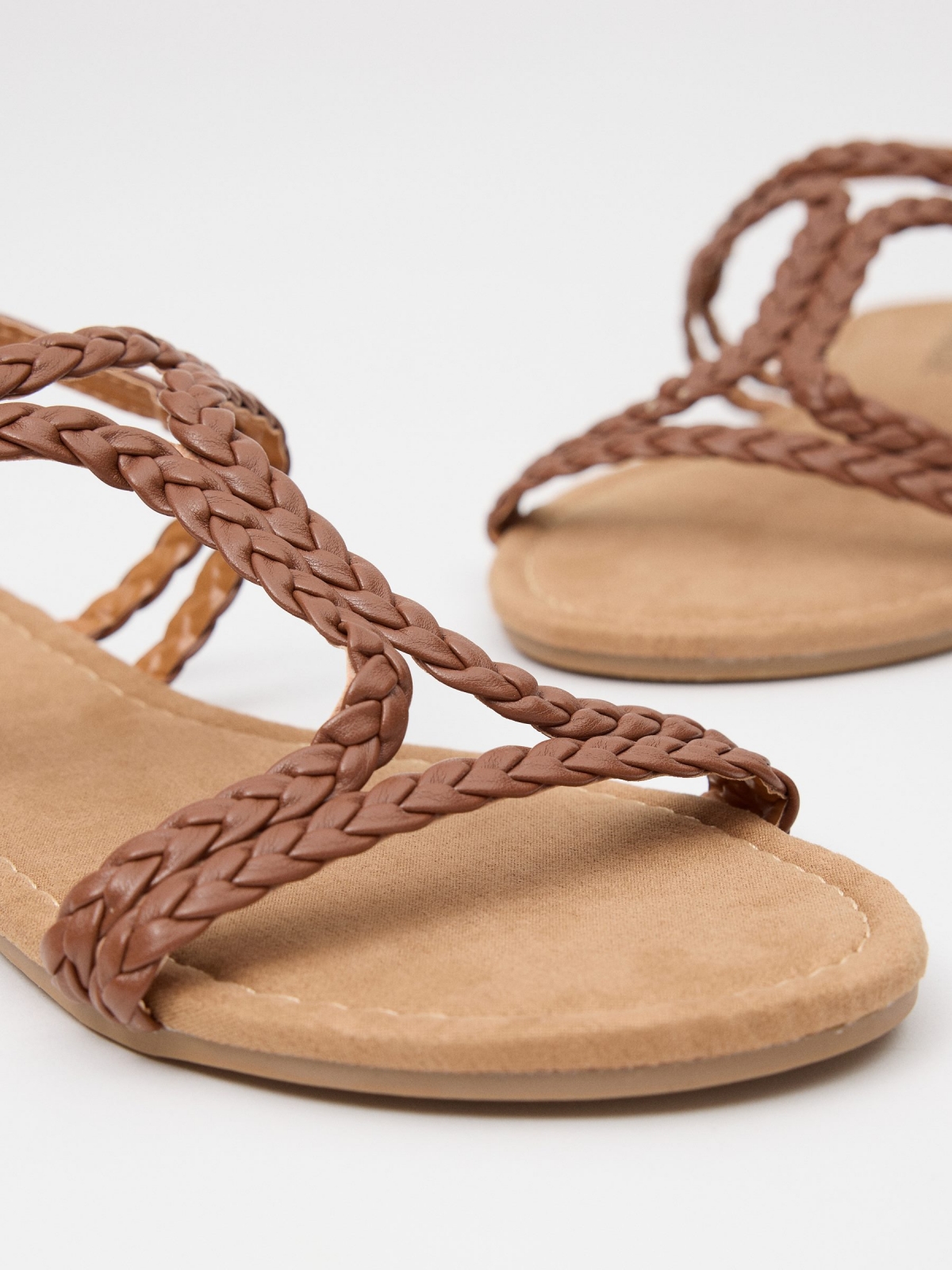 Sandals with crossed braided straps earth brown detail view