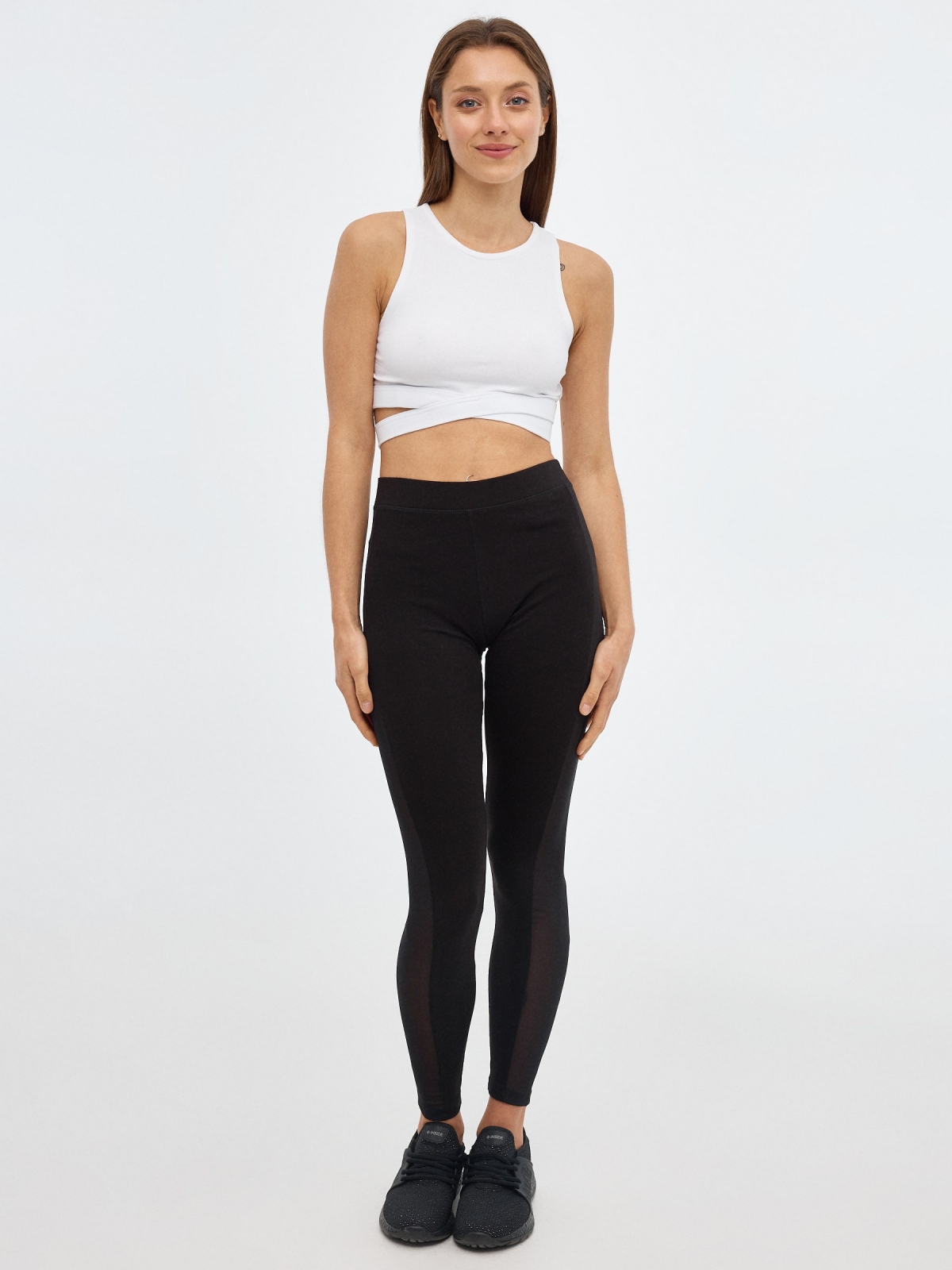 Knitted leggings with mesh detail black front view