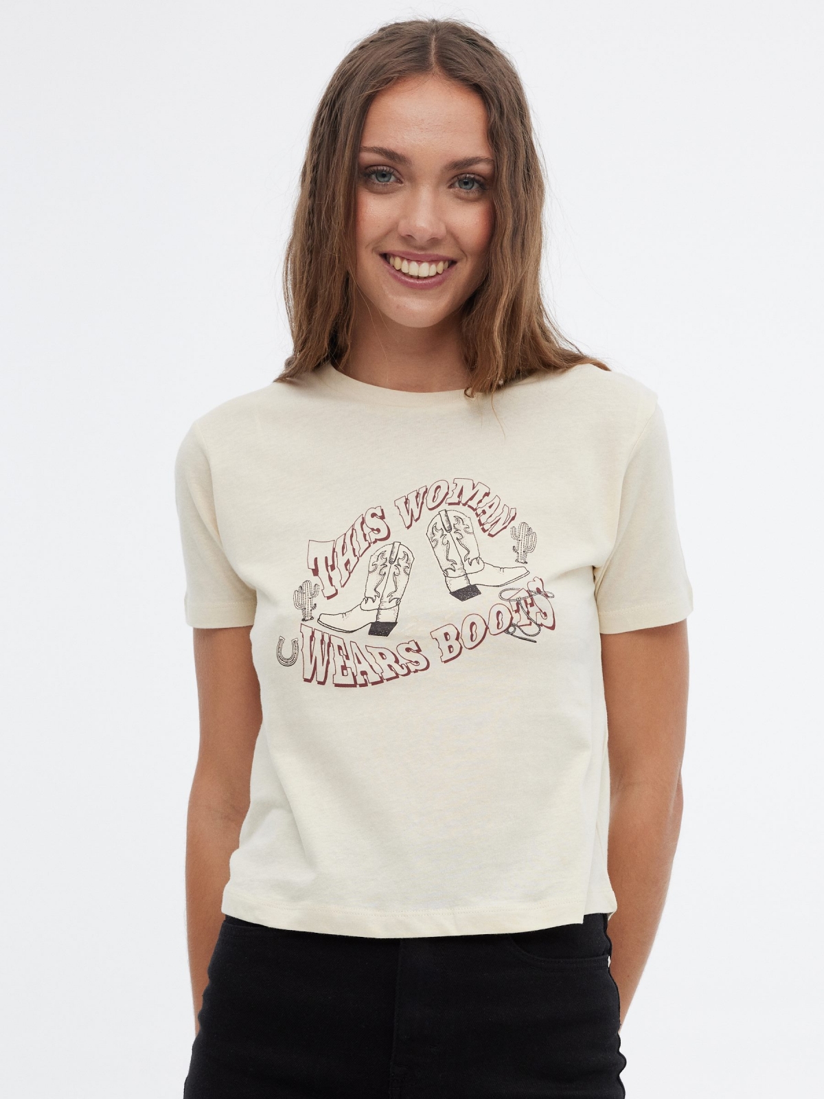 Wears Boots T-shirt sand middle front view