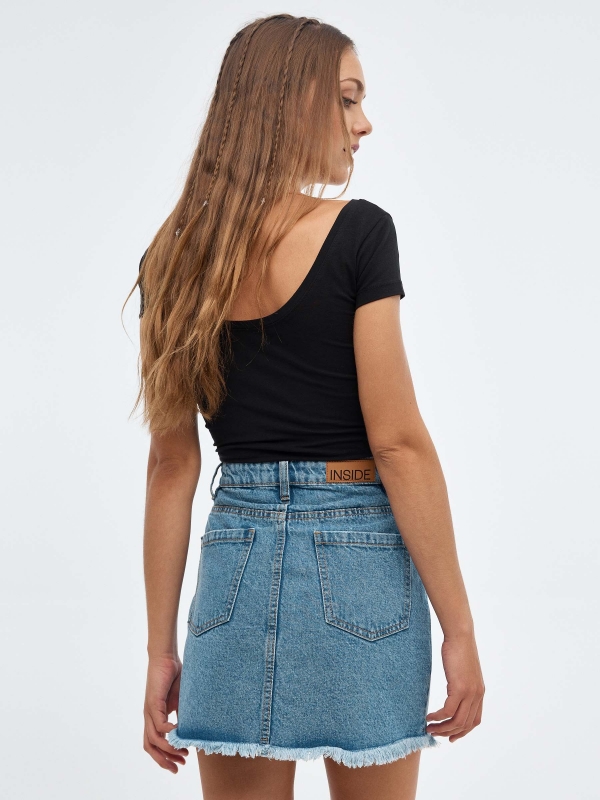 Denim mini skirt deflected blue middle back view