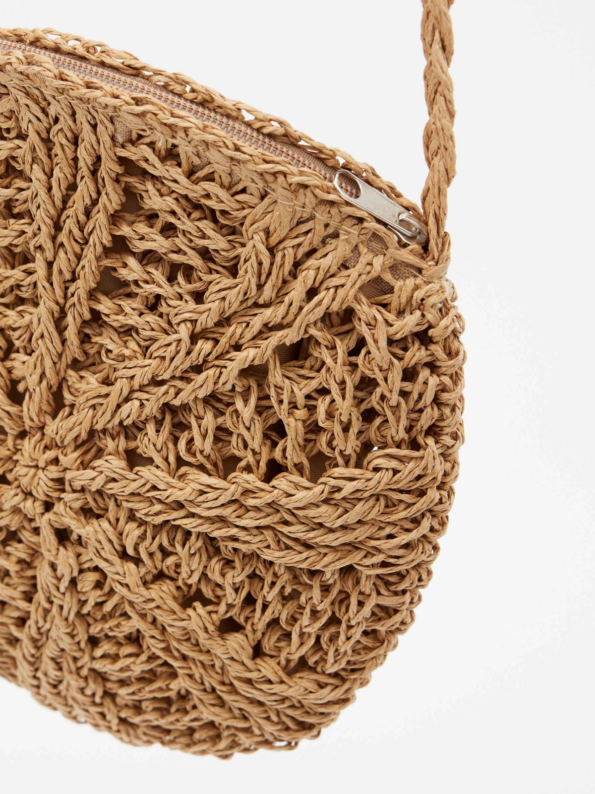 Round embroidered fiber bag beige detail view