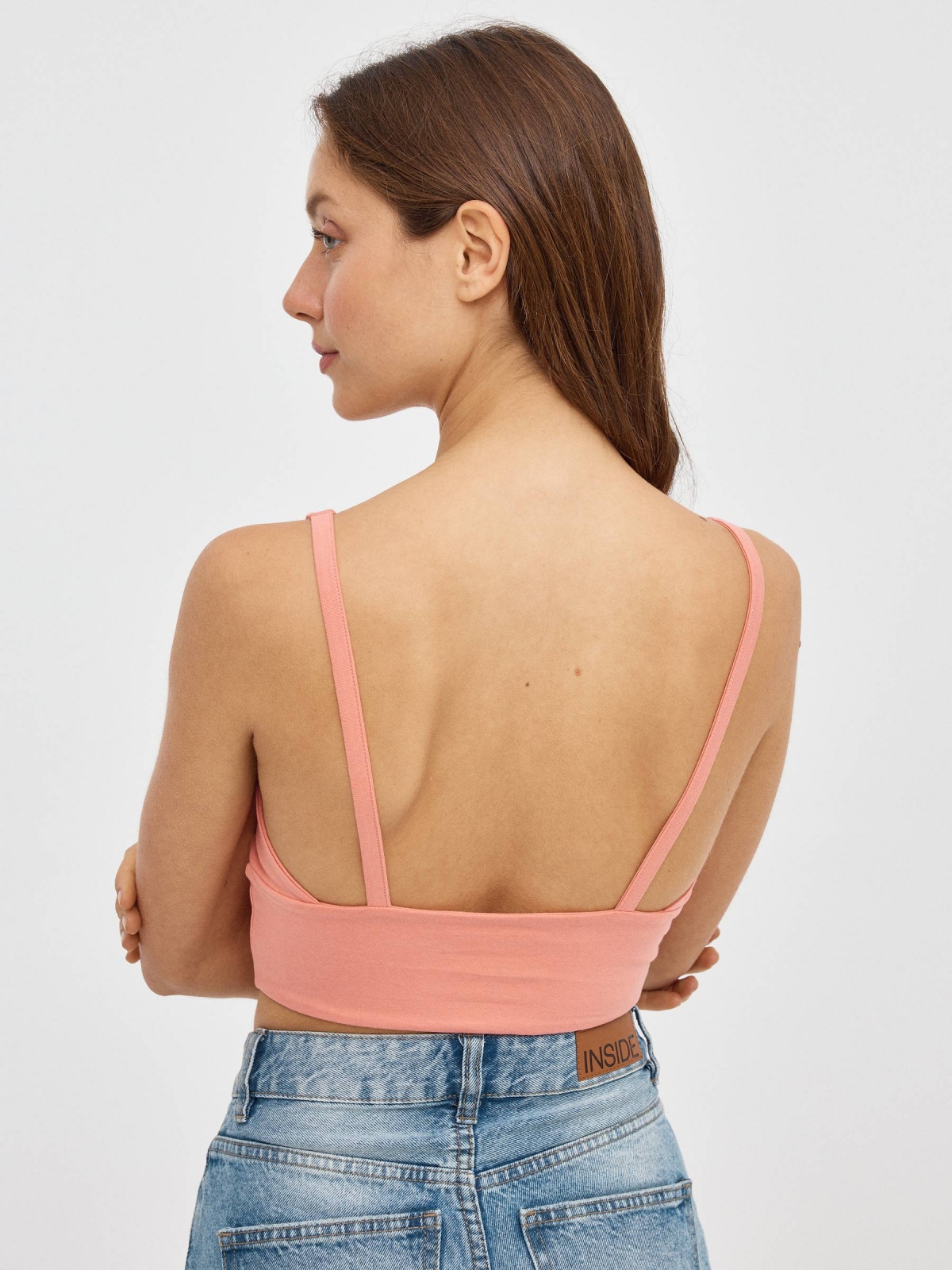 Corset style crop top salmon middle back view