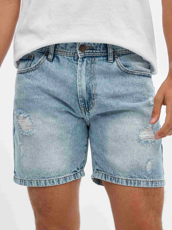 Denim Bermuda shorts with rips blue detail view