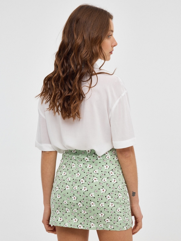 Green flower print mini skirt light green middle back view