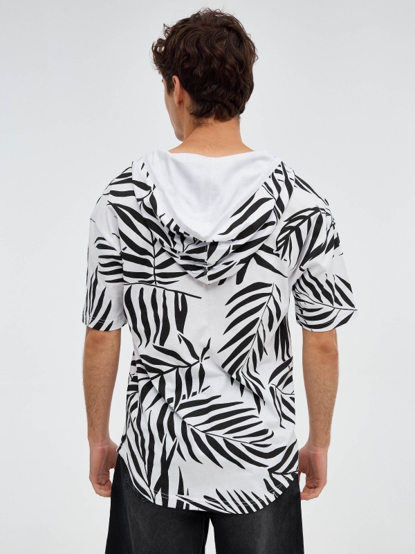 Oversized T-shirt palm tree leaves white middle back view