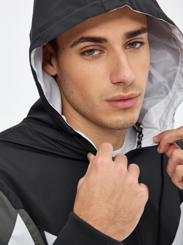Lightweight hooded jacket black detail view