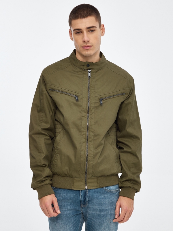 Black nylon jacket green middle front view