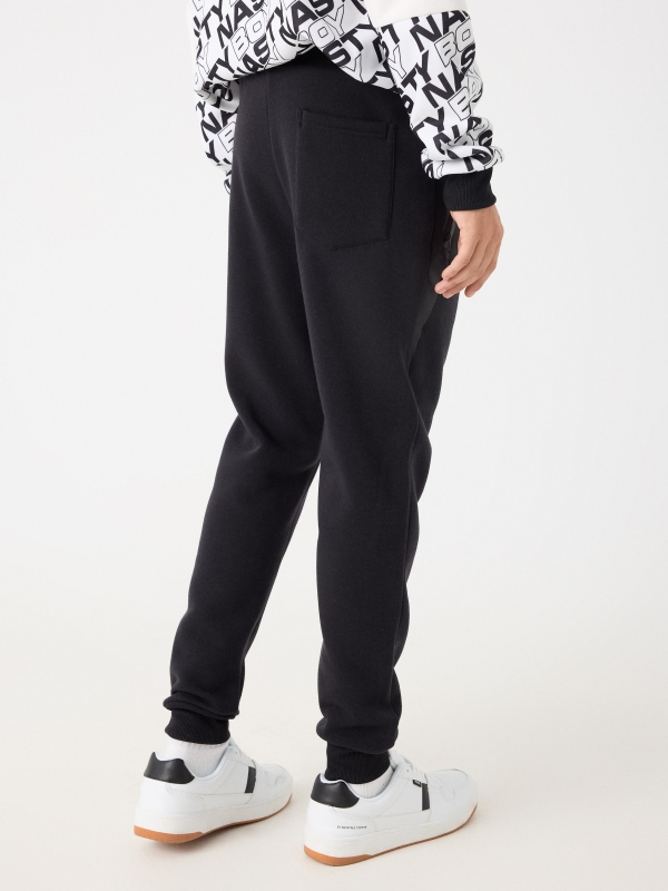 Black jogger pants with pockets black middle back view