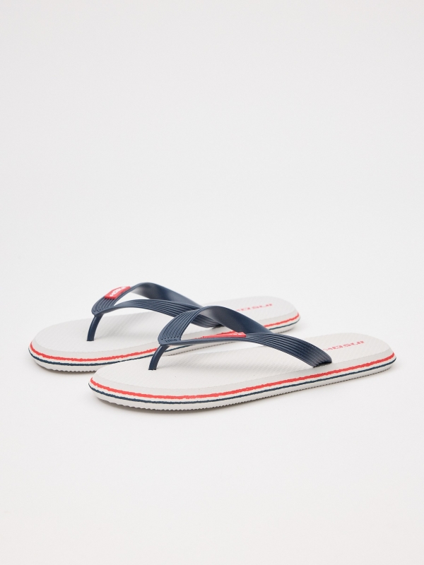 White toe flip flop with engraved strips white 45º front view