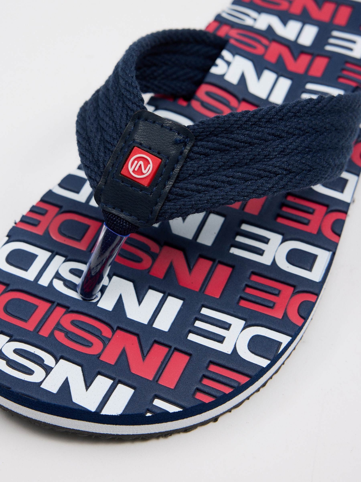 Engraved flip-flop toe navy detail view