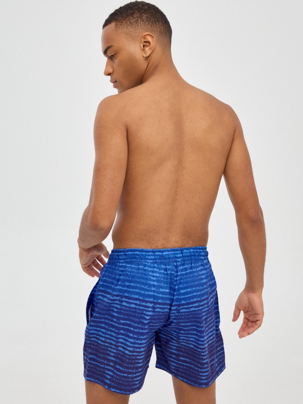 Striped degraded swimsuit navy middle back view