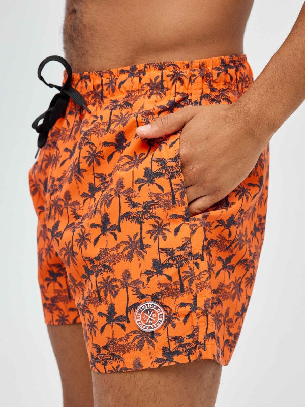 Totalprint swimsuit palm trees orange detail view