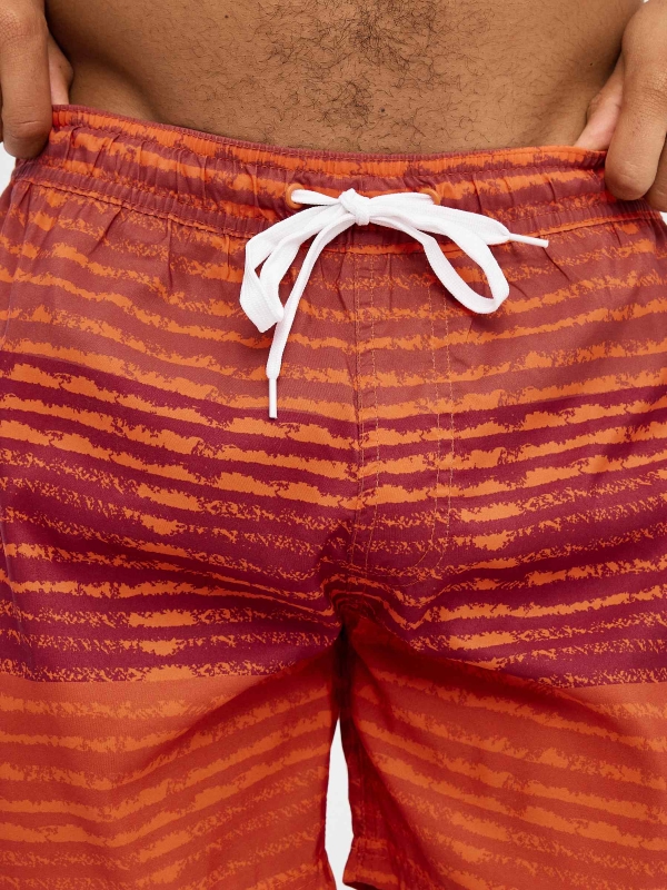 Striped degraded swimsuit red detail view