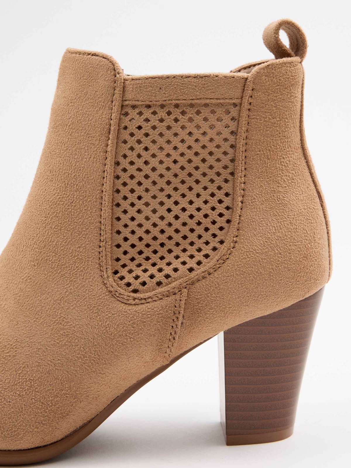 Beige ankle boots sand detail view