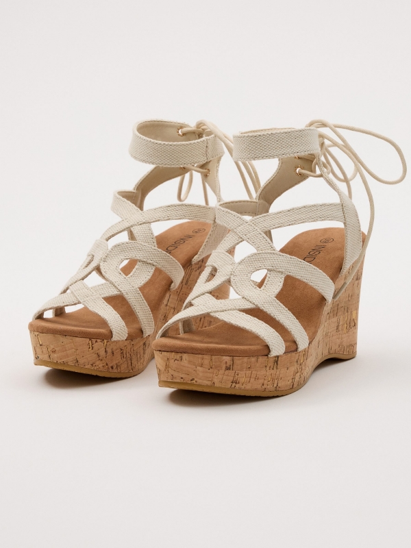 Wedges with lace-up straps sand 45º front view