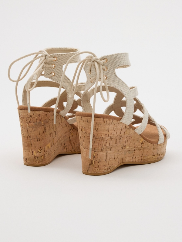Wedges with lace-up straps sand 45º back view