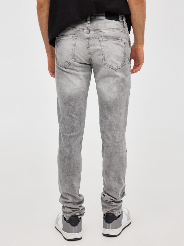 Grey super slim jeans grey middle back view